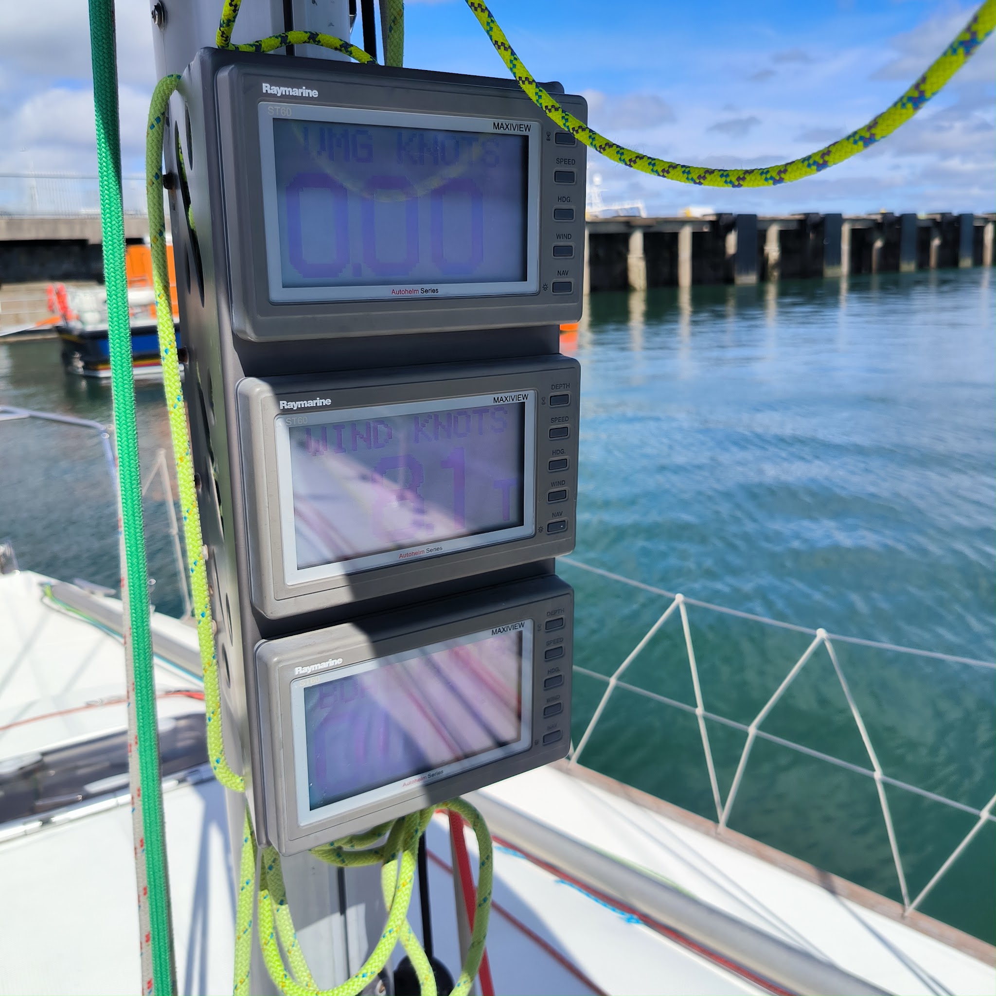 Three Raymarine displays at a helm