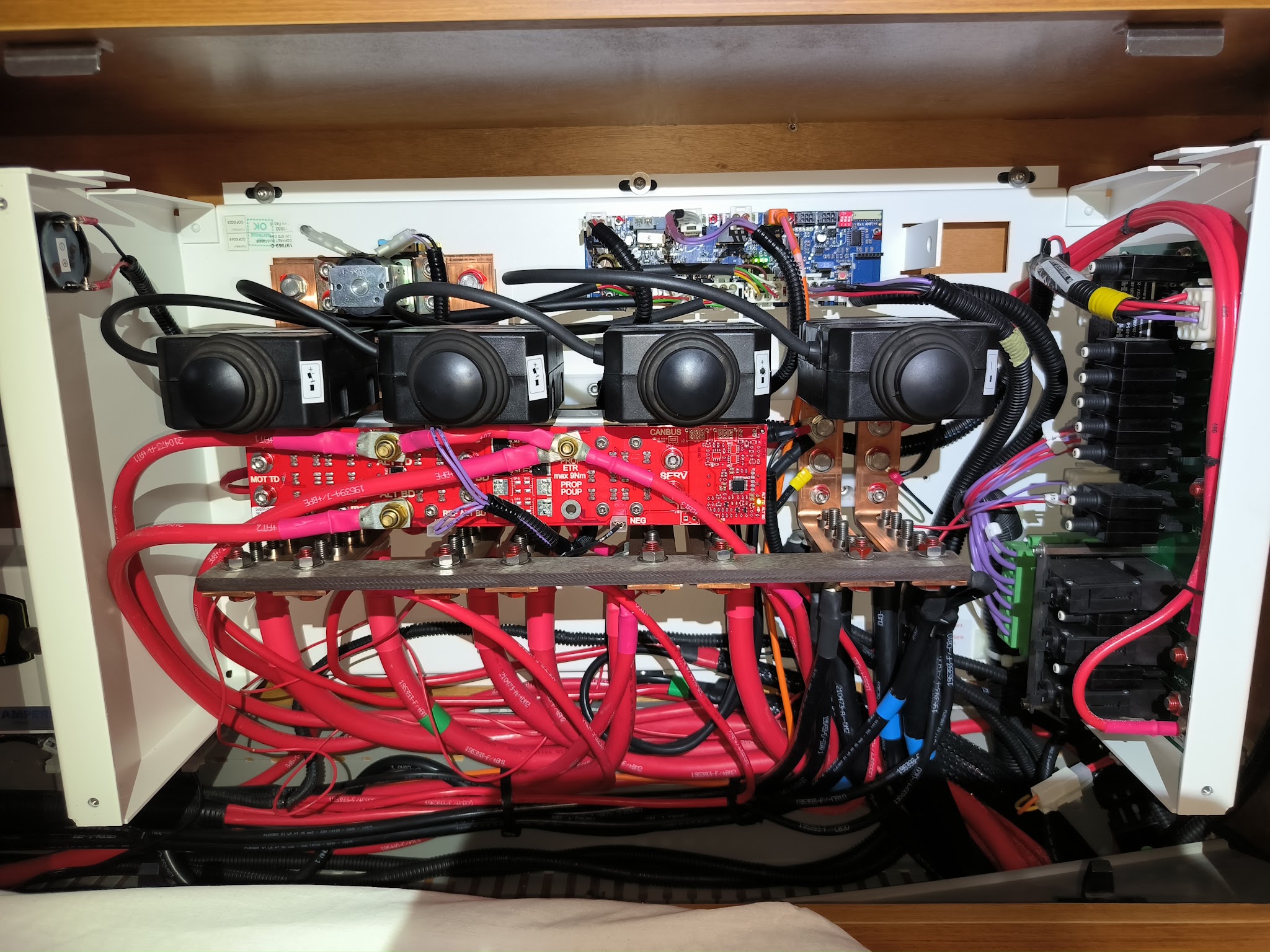 Marine control panel with red and black wiring